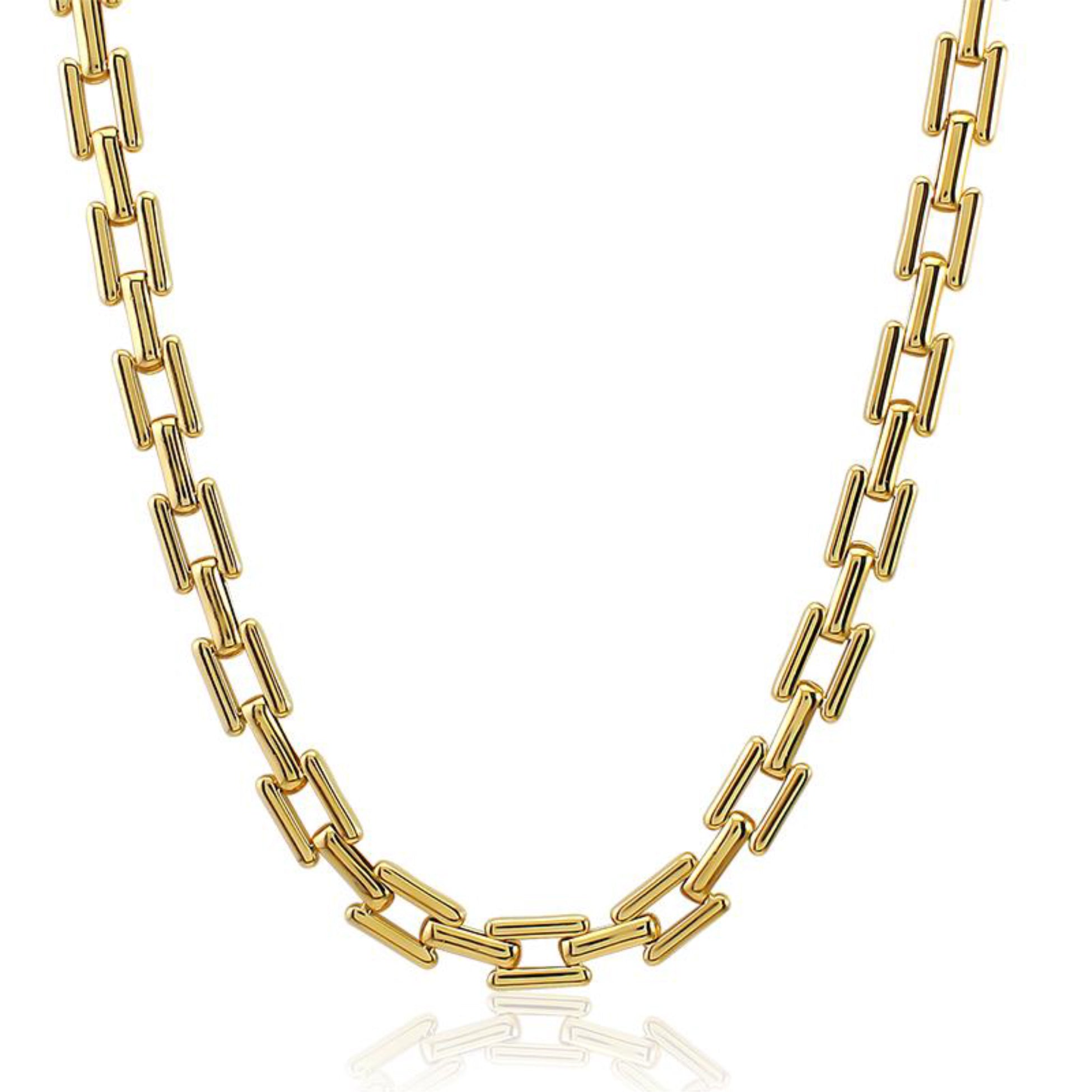 Gold chain necklace on a white background