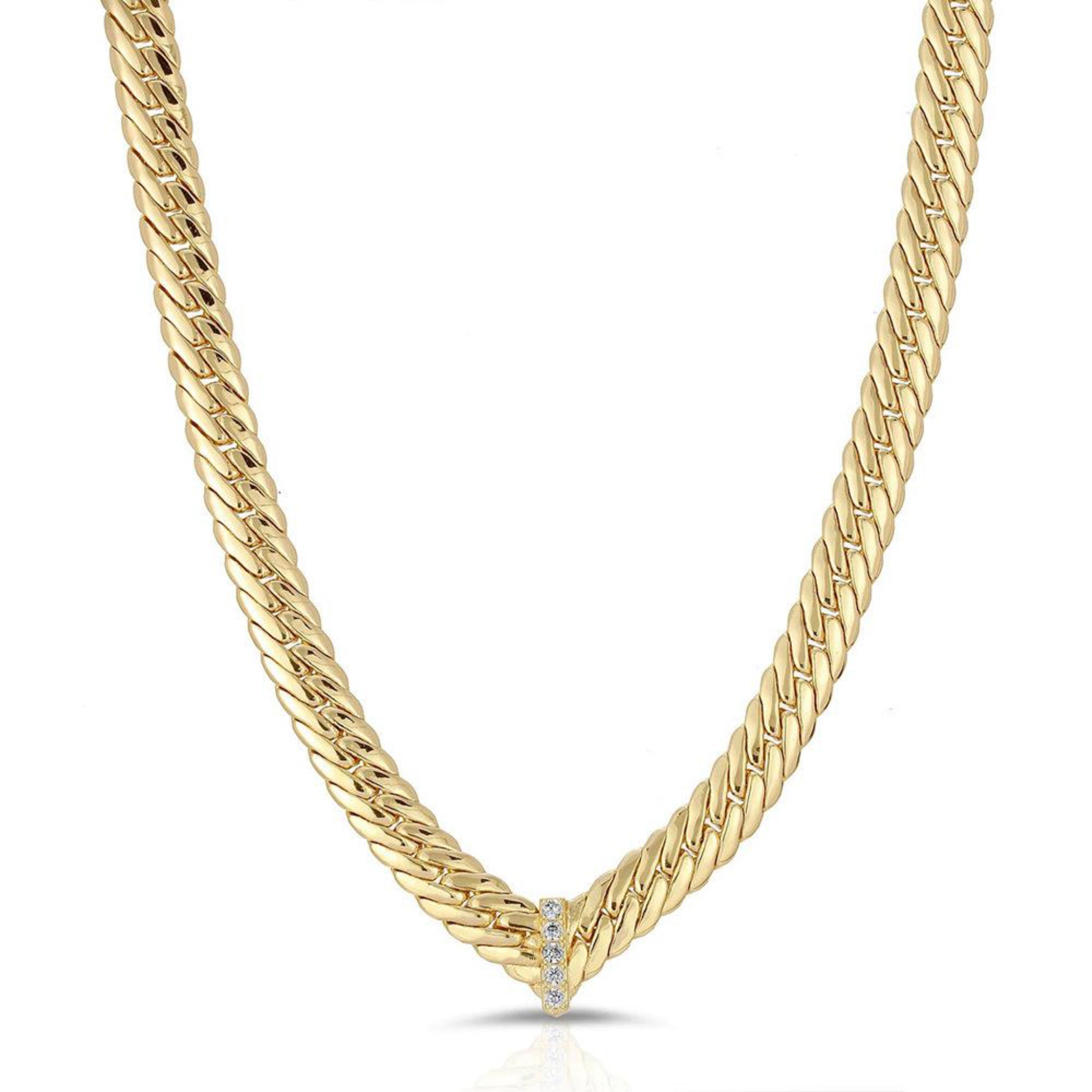 Gold chain necklace on a white background