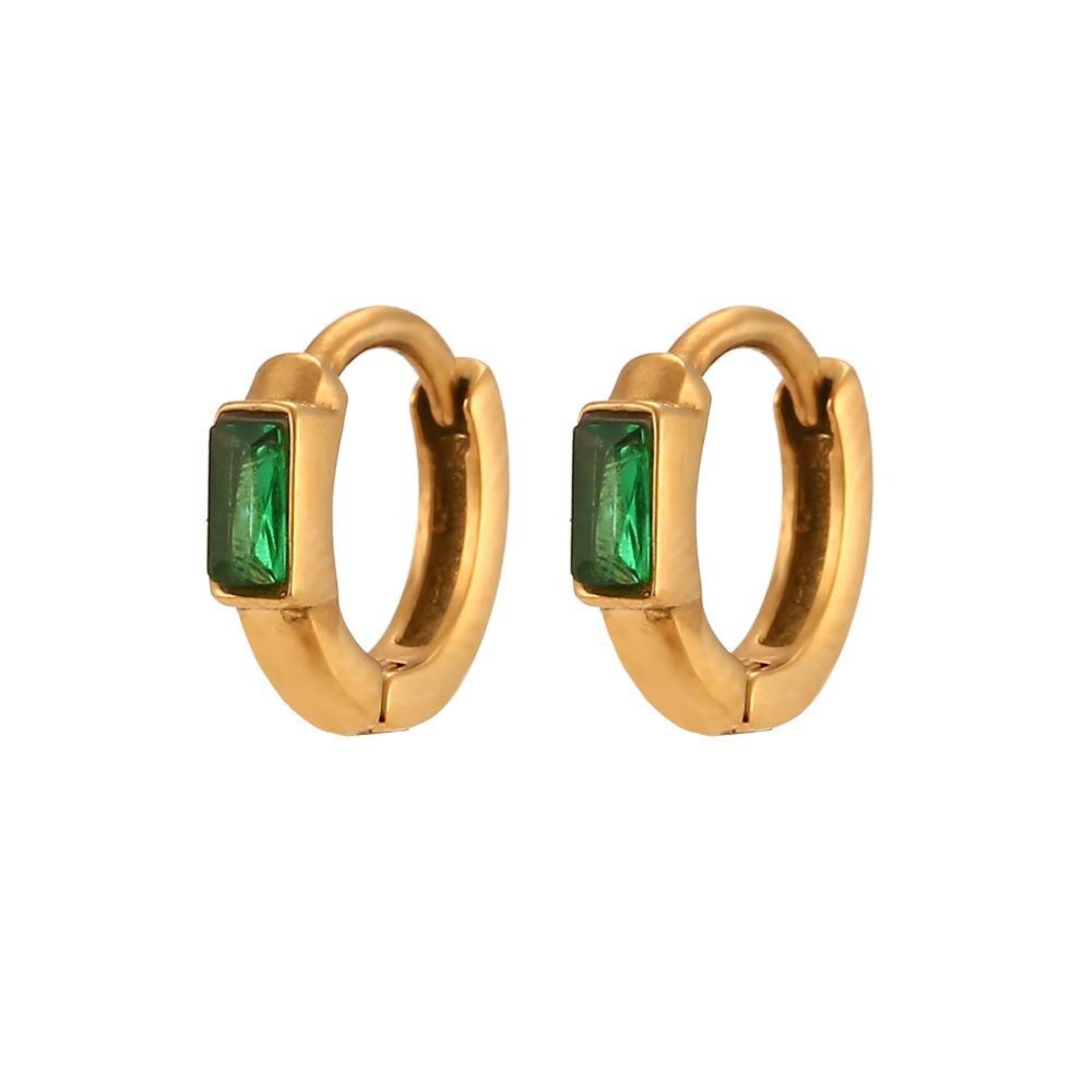 Gold hoop earrings with green gemstones on a white background