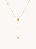 Gold necklace with heart-shaped pendants on a white background